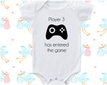 a baby bodysuit with a video game controller on it